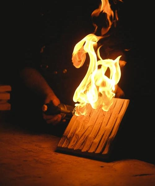 sheet board exposed to direct flame in fire testing environment