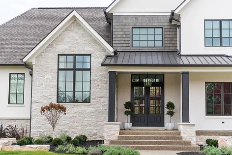 modern home exterior with clean lines and large glass panels