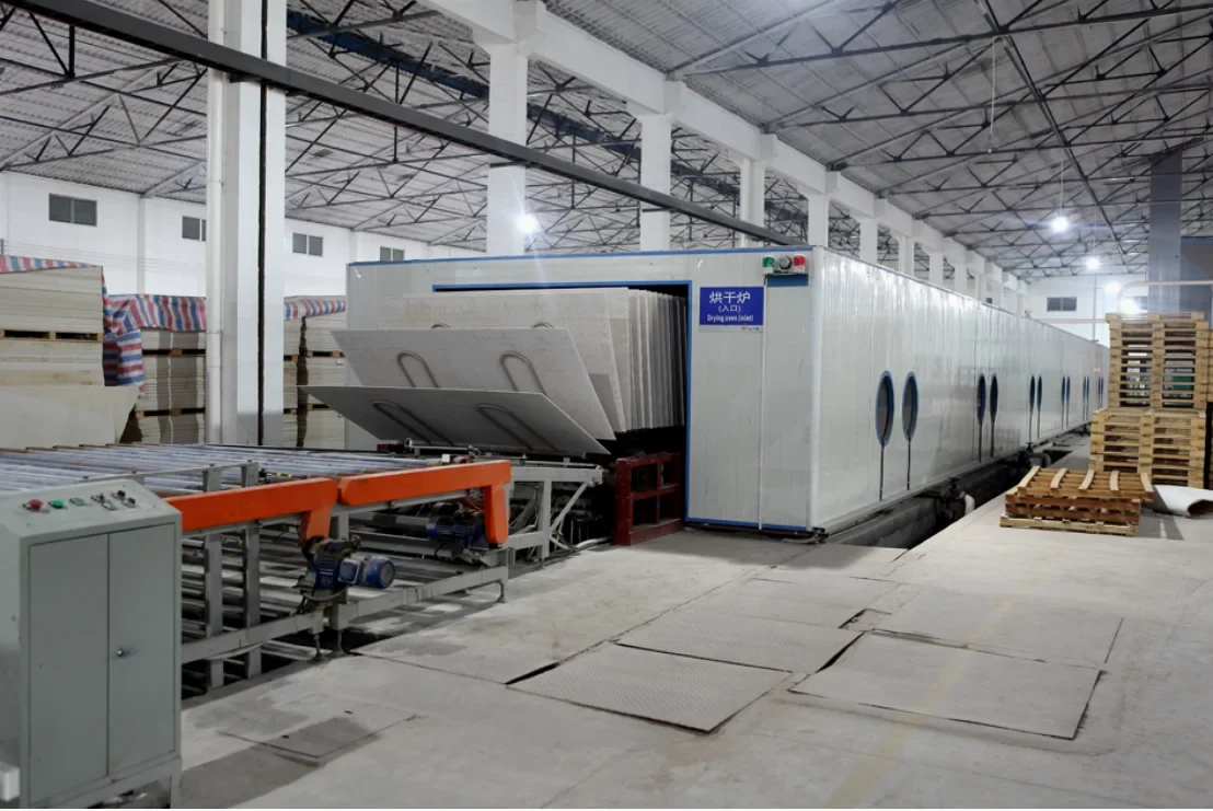 automated machine unloading dried boards in the factory