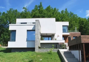 suburban house exterior long shot clear sky view