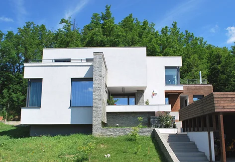 suburban house exterior long shot clear sky view