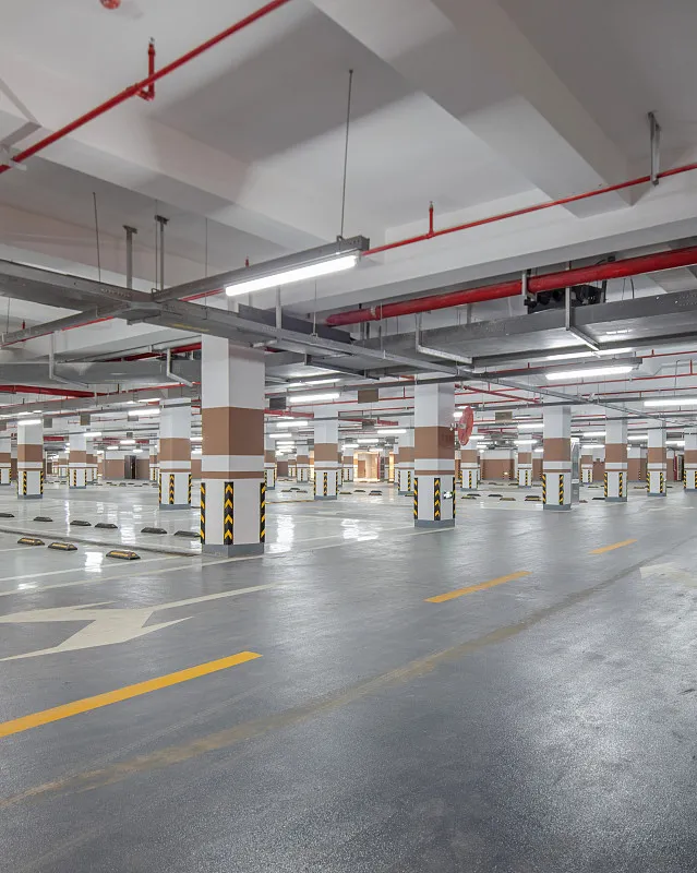 underground garage structural elements and floor closeup