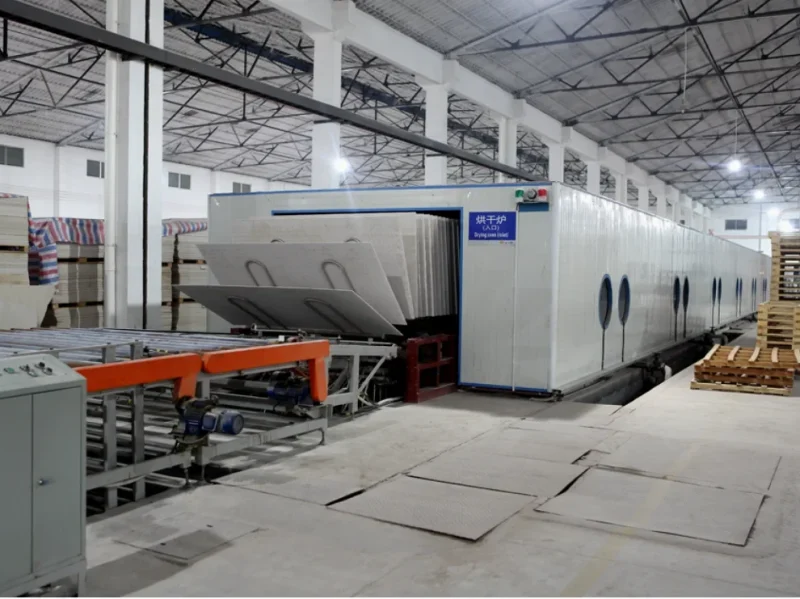 automated machine unloading dried boards in the factory